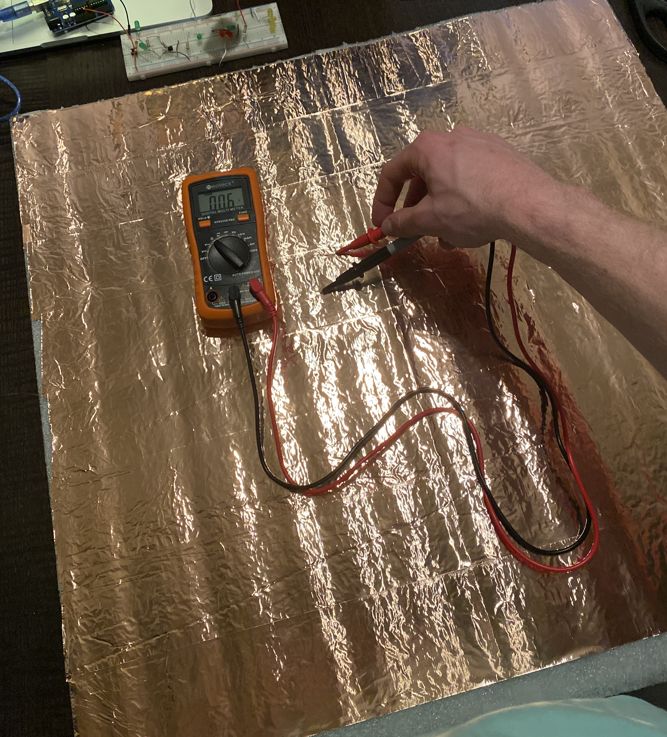 A finished sheet of the layered copper tape strips. Resistance was negligible.