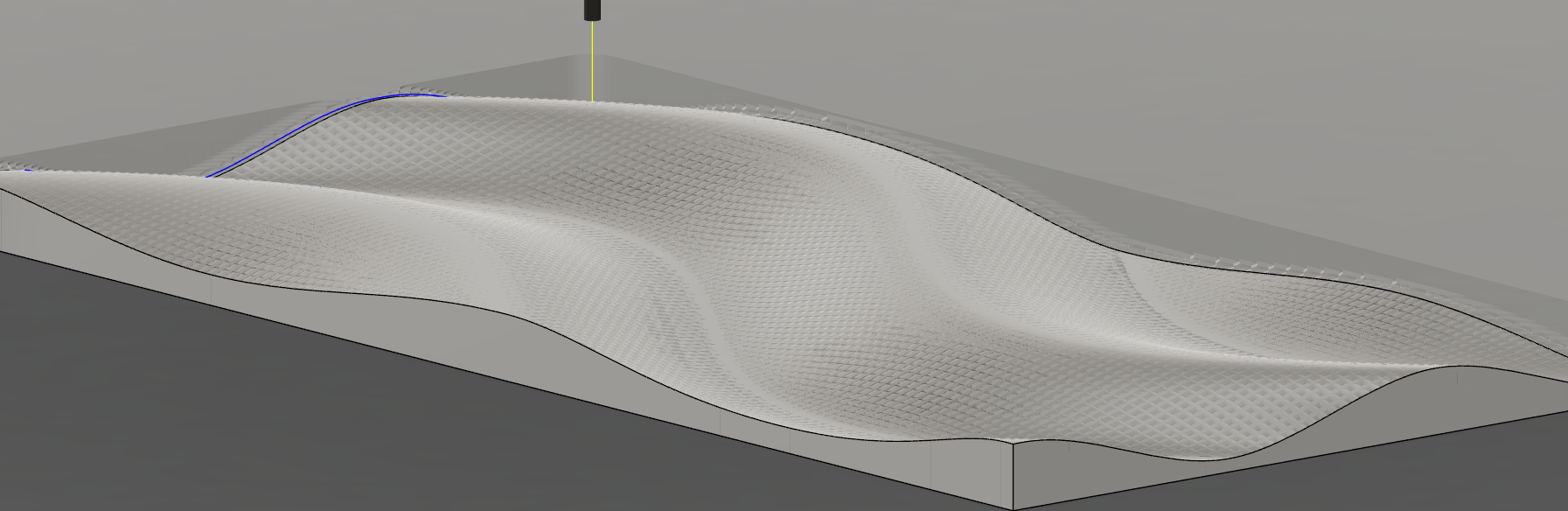 The CAM stage, with simulated toolpaths showing a combination of different toolpath grooves